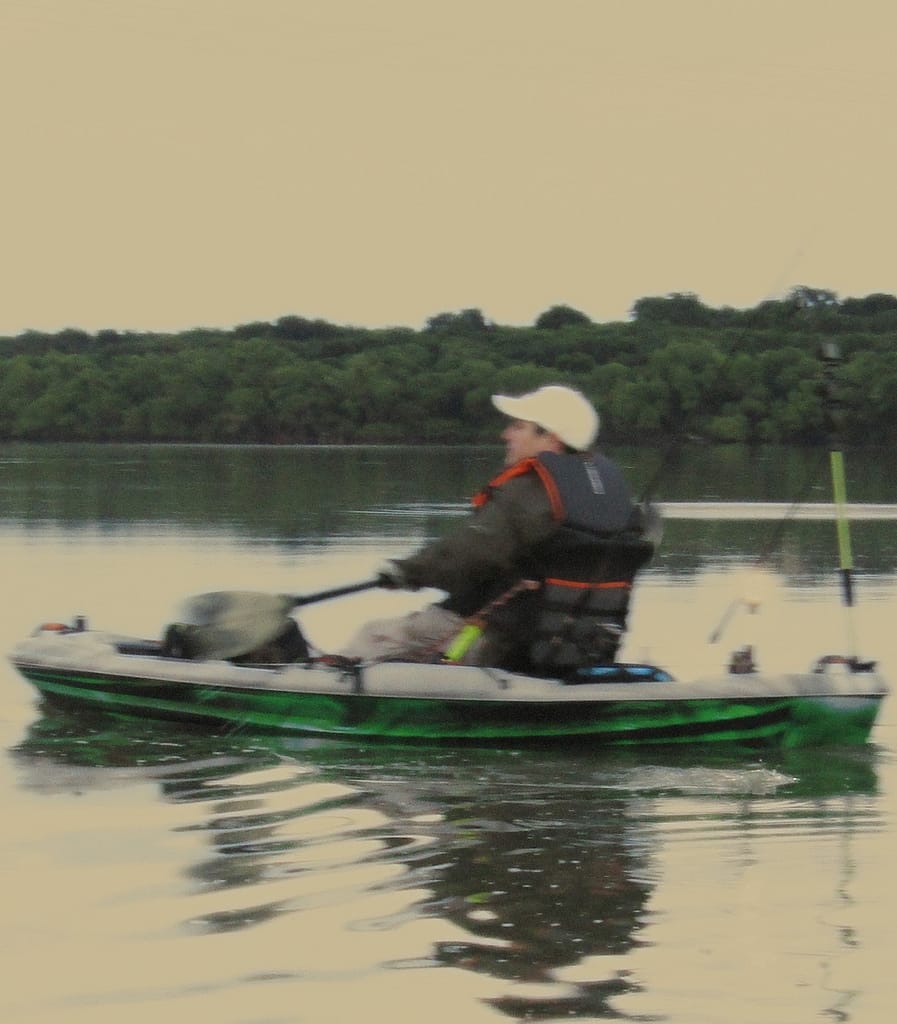 A small kayak with a slow, steady paddle can allow you to sneak into almost any waterway undetected